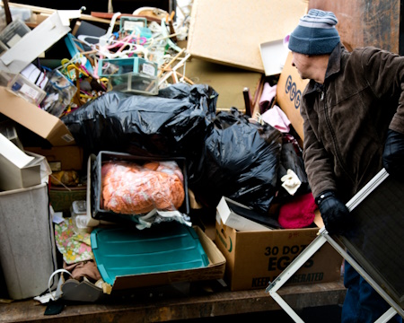 filling the dumpster